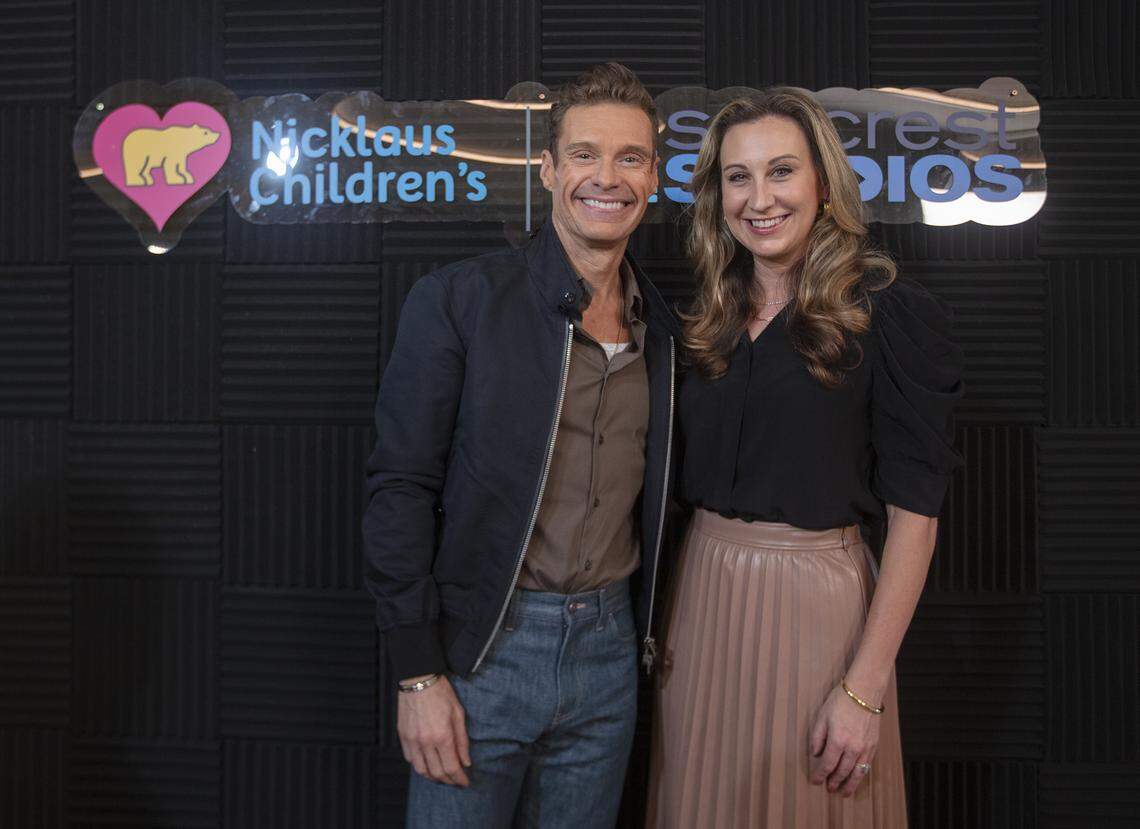 Ryan Seacrest and his sister, Meredith Seacrest Leach, arrive on the red carpet for the Nicklaus Children’s Hospital Seacrest Studio grand opening on Tuesday, Dec. 9, 2025, at Nicklaus Children’s Hospital in Miami.