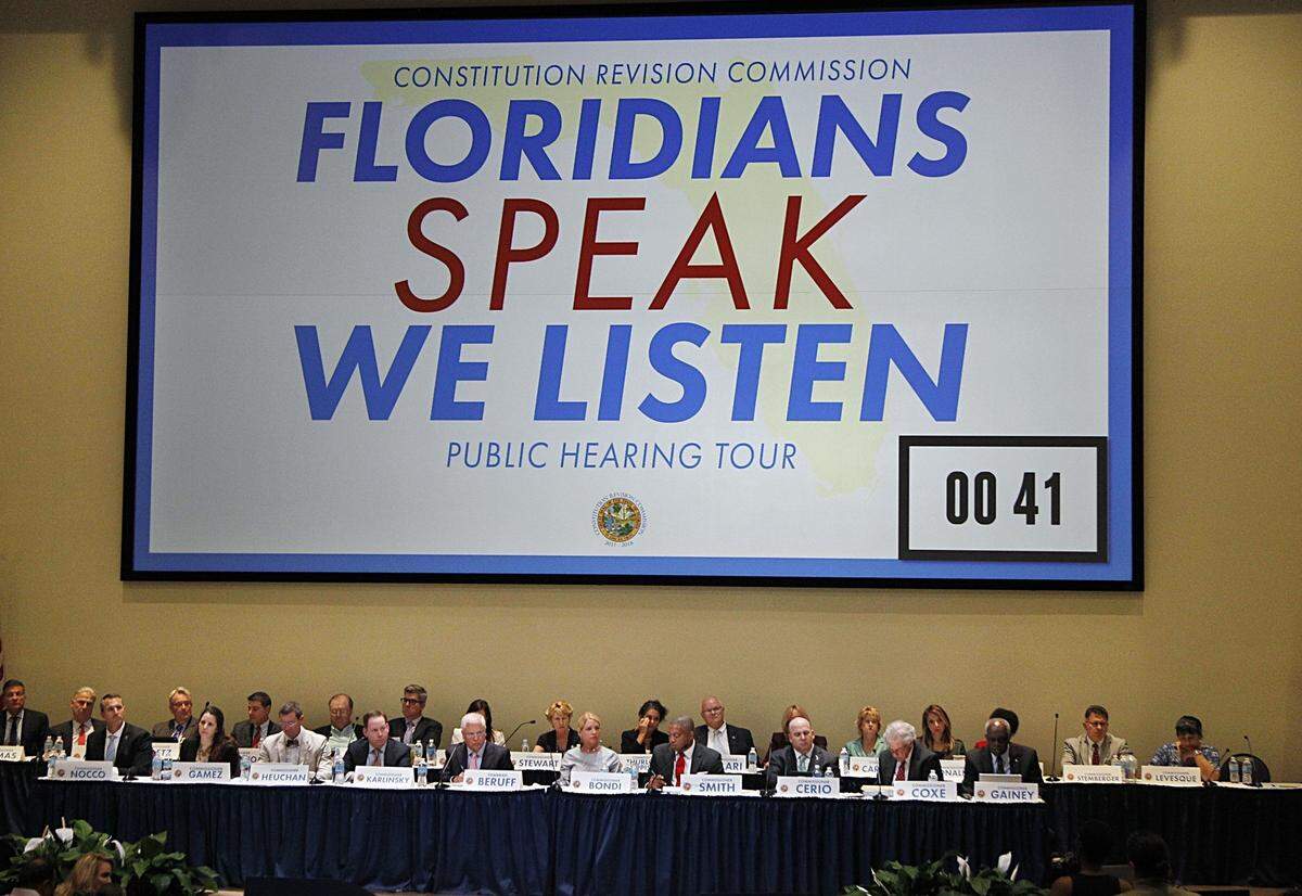 Two Florida counties have filed lawsuits saying that an amendment put on the ballot by the Constitution Revision Commission, shown during a 2017 town hall meeting in Miami, is unconstitutionally misleading because it fails to explain that it would strip voters in Broward and Volusia counties of their right to govern themselves.