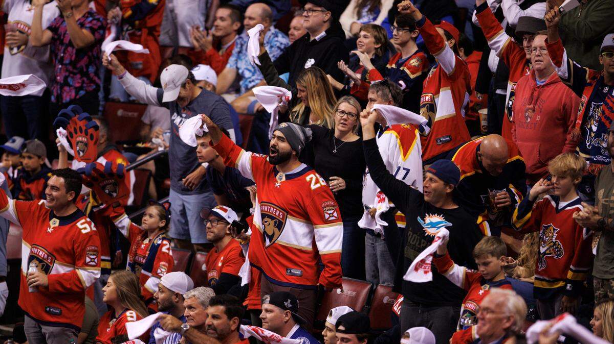 Hockey fans showing their support to their teams during the second period of Game 2 of a second round NHL Stanley Cup series between the Florida Panthers against the Tampa Bay Lightning at FLA Live Arena on Thursday, May 19, 2022 in Sunrise, Fl.