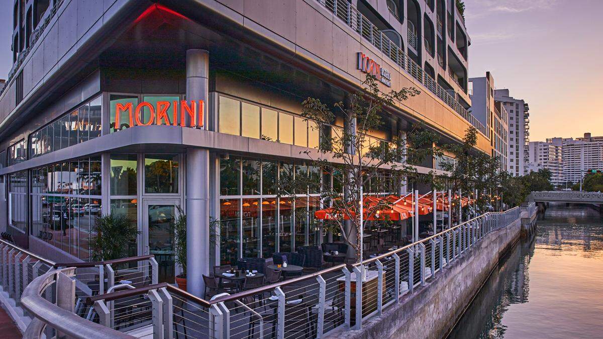 Osteria Morini has outdoor seating along the Collins Canal.