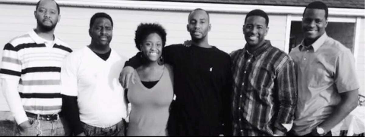 From left: Patrick, Chuck, Monique, Eric, Andrew and Marcus Gillum. (Terrance Gillum, Andrew’s older brother, lives in California and is missing from the photo.)