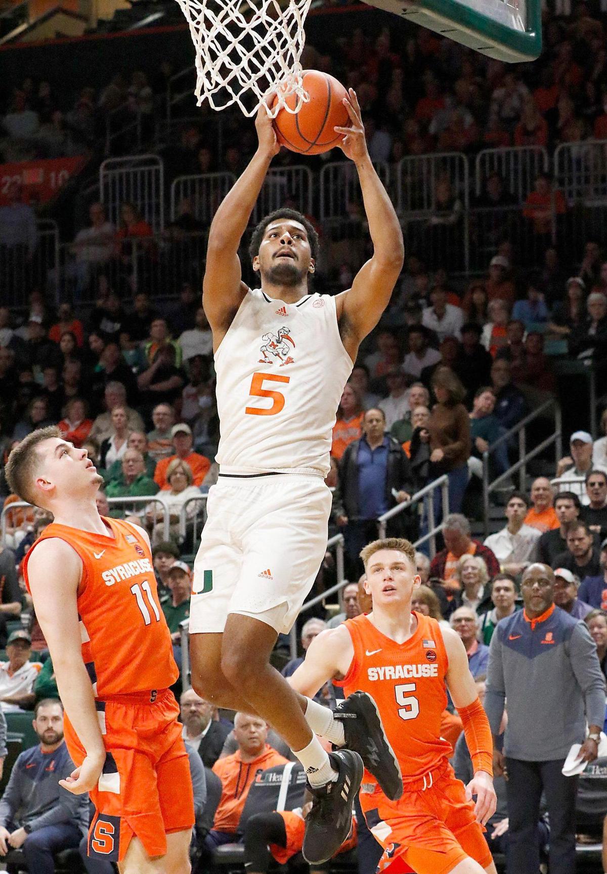 UM Hurricanes Harlond Beverly (5) goes for a shot agains Syracuse Orange during NCAA men’s basketball game on Monday, January 16, 2023 at Watsco Center in Coral Gables. Andrew Uloza / for Miami Herald