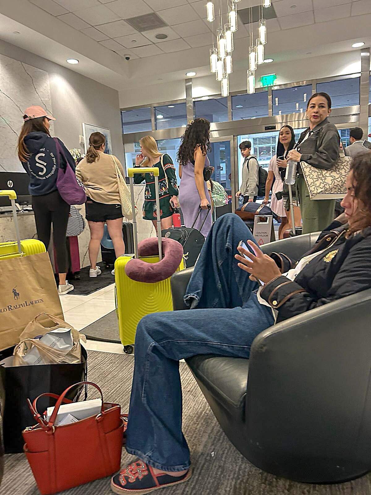 Airbnb guests gather at the lobby of The Club at Brickell Bay condo where 85 percent of the units are rented through Airbnb and other vacation sites. Residents of The Club at Brickell Bay, a condo tower where 85 percent of the units are rented through Airbnb and other vacation sites, are fighting to reclaim their once peaceful life