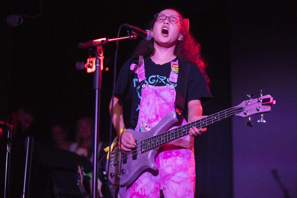 Micah Clyman play and signs during the Miami Girls Rock Camp at The Ground at Space, Miami; on Saturday, August 2, 2025. The all-ages event featured live performances from 10 brand-new camper bands, showcasing original songs created during camp week.