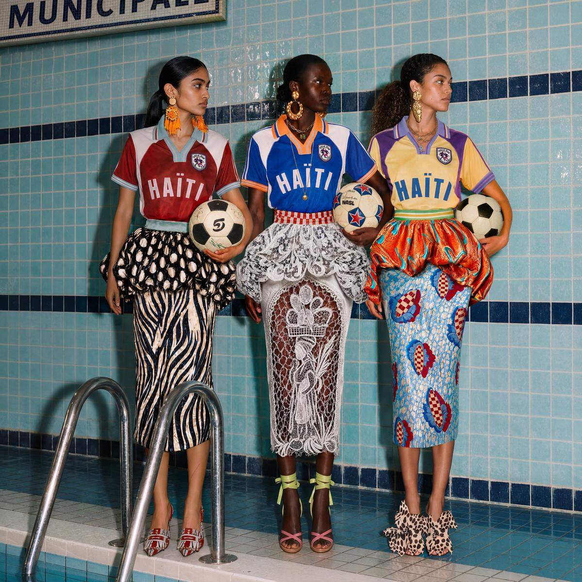 Haitian-Italian designer Stella Jean has launched a handmade line of 100% cotton World-Cup inspired silhouettes Polo T-shirt and long T-shirt dresses. Her decision to create a Haiti World Cup-inspired line, she said, had little to do with sports merchandising and everything to do with creating a ‘cultural object capable of carrying dignity, identity, memory and representation.’