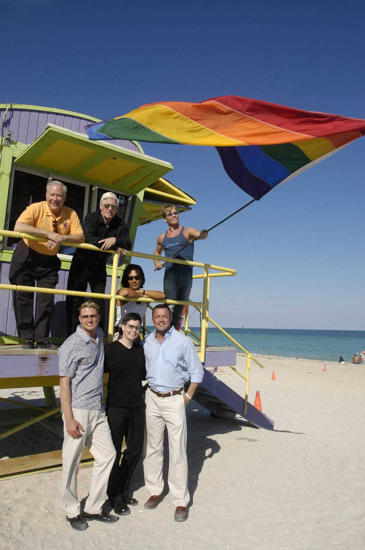 Organizers and supporters of the Winter Party festival gather on a lifeguard stand on 12th Street beach in South Beach on Feb. 16, 2005. From left, back row: Michael Aller, William Talbert III, Richard Shon, David Sexton. Front row: Charles Robbins, Julie Garrity and Joe Guerrero.