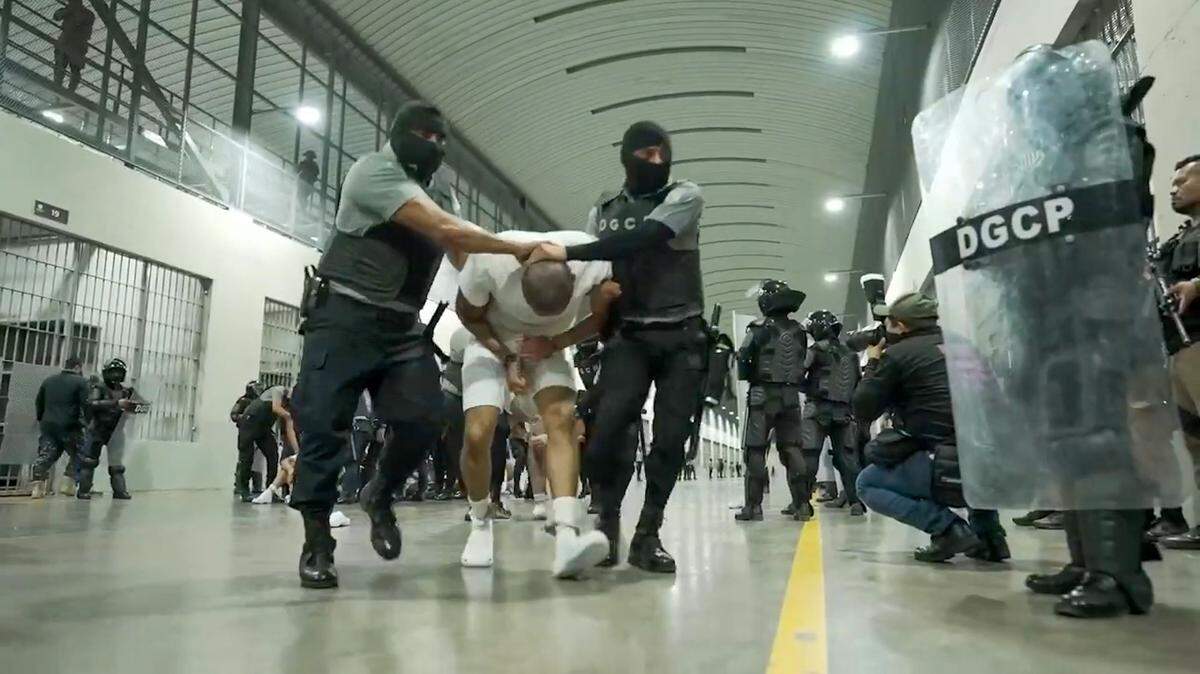 A screengrab from a video obtained from the El Salvador Presidential Press Office shows alleged members of the Venezuelan gang Tren de Aragua, deported by the U.S. government, detained at the Terrorism Confinement Center in Tecoluca, El Salvador, on March 16, 2025.