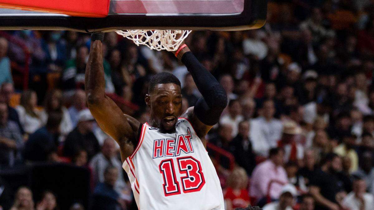 Miami Heat center Bam Adebayo (13) dunks over Boston Celtics center Robert Williams III (44) during the second half of an NBA game at Miami-Dade Arena in Downtown Miami, Florida, on Tuesday, January 24, 2023.