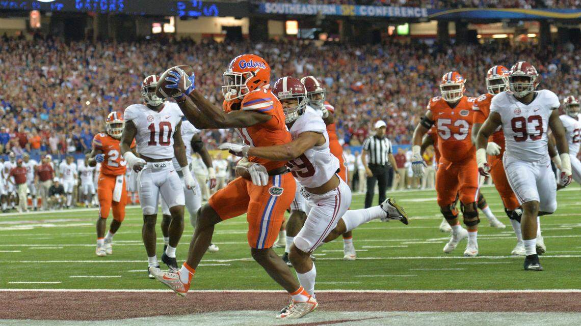 Florida wide receiver Antonio Callaway (81) catches a touchdown pass against Alabama in the first half during the Southeastern Conference championship at the Georgia Dome in Atlanta on Saturday, Dec. 3, 2016.