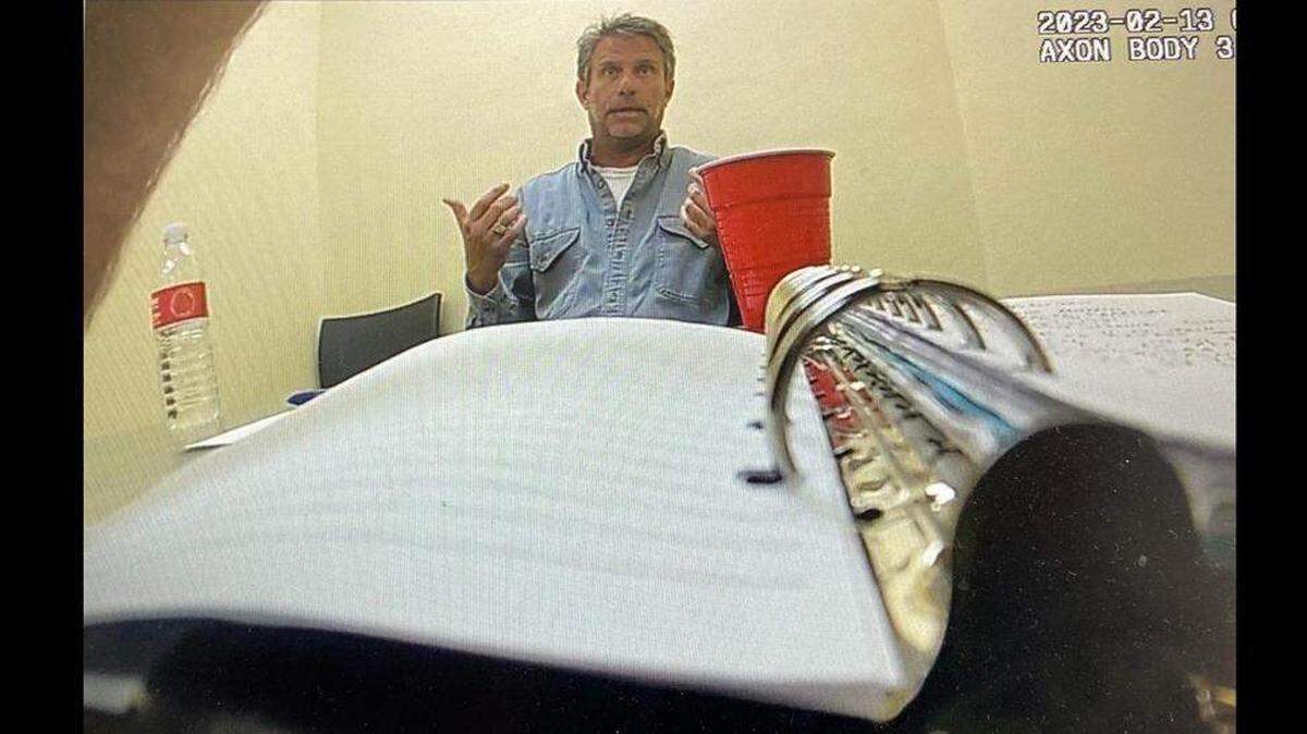Lloyd Preston Brewer III talks to Key West police on Feb. 13, 2023, hours after he shot and killed 21-year-old Garrett Hughes outside of a local bar. A jury convicted Brewer of first-degree murder Wednesday, Jan. 21, 2026.