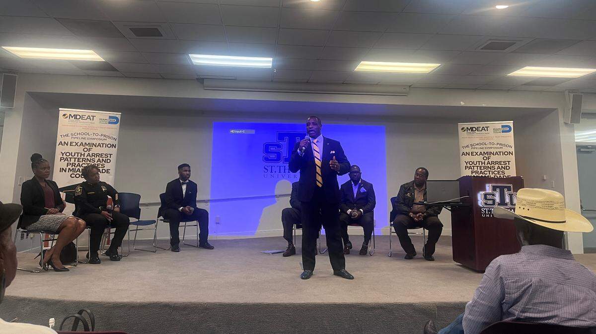 Tim Belcher, the retired deputy chief at the Lauderhill police department and assistant chief of the North Miami police department, addressed the crowd at Miami-Dade Economic Advocacy Trust’s “School-to-Prison Pipeline Symposium” where the disparities in youth arrests were the main point of discussion. Between 2010-2022, Black children account for nearly 60% of youth arrests despite representing roughly 18% of the population, according to the University of Miami’s study commissioned by MDEAT.