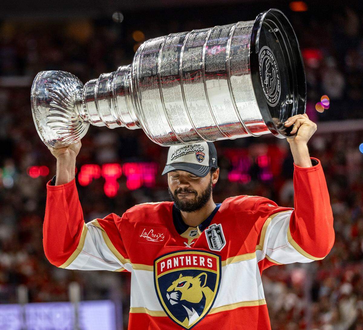 Florida Panthers defenseman Seth Jones (3) lifts the Stanley Cup after the Panthers defeated the Edmonton Oilers in Game 6 