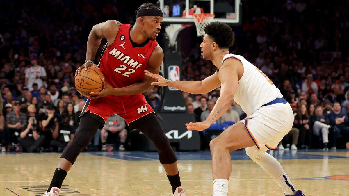 Miami Heat forward Jimmy Butler (22) controls the ball against New York Knicks guard Quentin Grimes (6) during the second quarter of game one of the 2023 NBA Eastern Conference semifinal playoffs at Madison Square Garden.