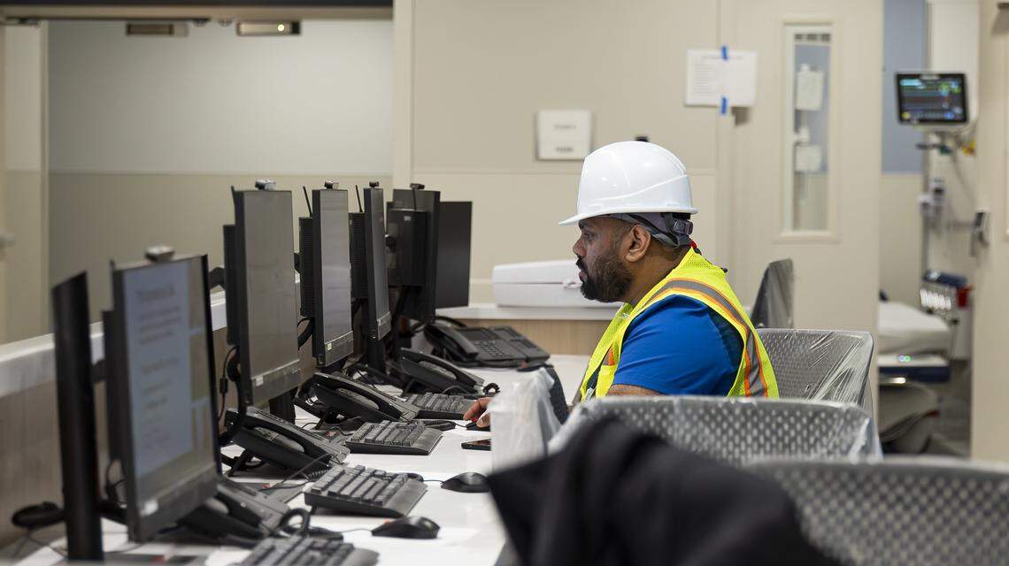 Jackson Memorial Hospital ER nurse Peter Panicker uses a computer at a nurses' station during a tour of the hospital's new emergency department on Thursday, March 5, 2026, in Miami, Fla. The new facility doubles the size of the current emergency room and is expected to reduce patient wait times.