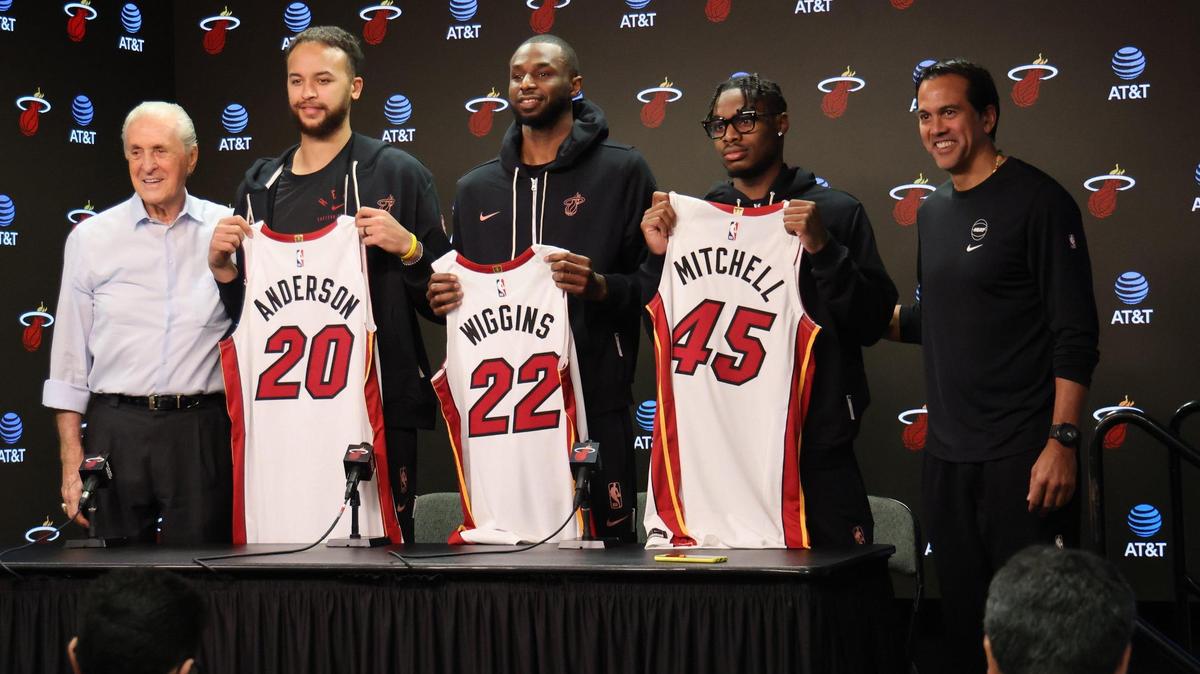 Miami Heat president Pat Riley and head coach Erik Spoelstra pose with the team’s newest members forward Kyle Anderson (20), forward Andrew Wiggins (22), and point guard Davion Mitchell (45) during their introductory press conference at Kaseya Center in Miami on Feb. 9, 2025.