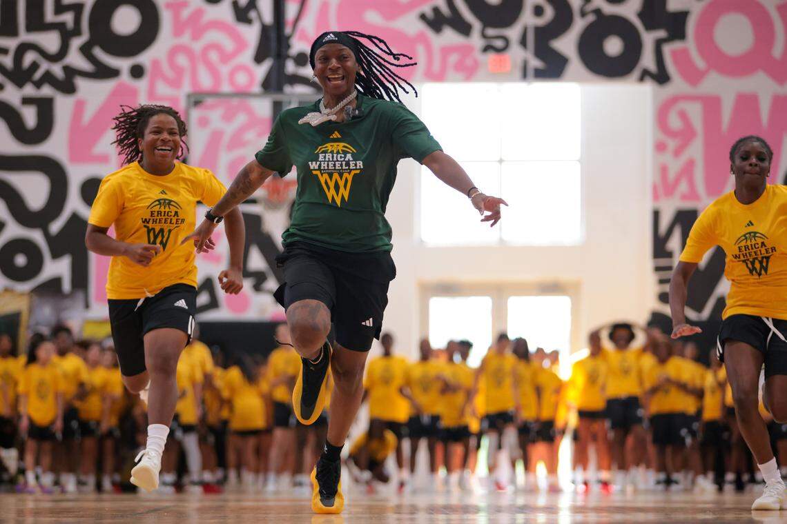 WNBA basketball player Erica Wheeler sprints against campers during the Erica Wheeler Basketball Camp at Bucky Dent Park at 2240 W 60th St., in Hialeah, Florida, Saturday, October 18, 2025.