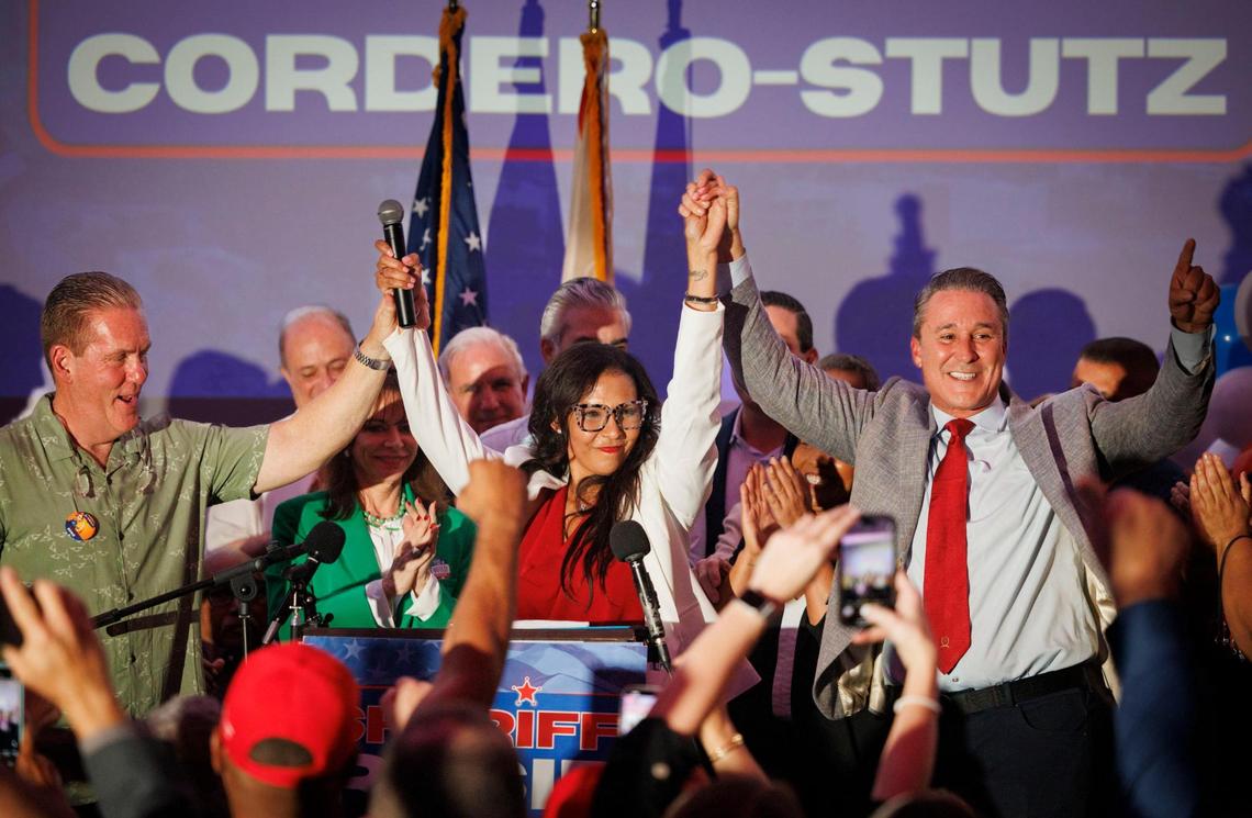 Rosie Cordero-Stutz, center, celebrates with her husband, Kurt Cordero, left, and Miami-Dade Commissioner Rene Garcia after winning the race for Miami-Dade sheriff. The GOP candidate, Cordero-Stutz gave her victory speech Tuesday, Nov. 5, 2024, at the EB Hotel in Miami.