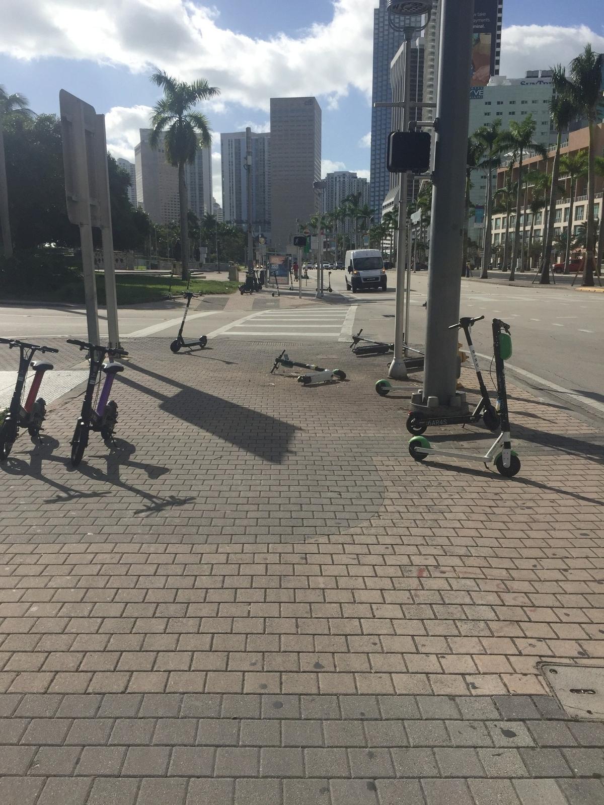 Scooters found downtown Nov. 26, 2020, by downtown resident Brian Gadinsky. Miami is suspending its scooter program effective Dec. 30 after complaints of clutter and underage riders.