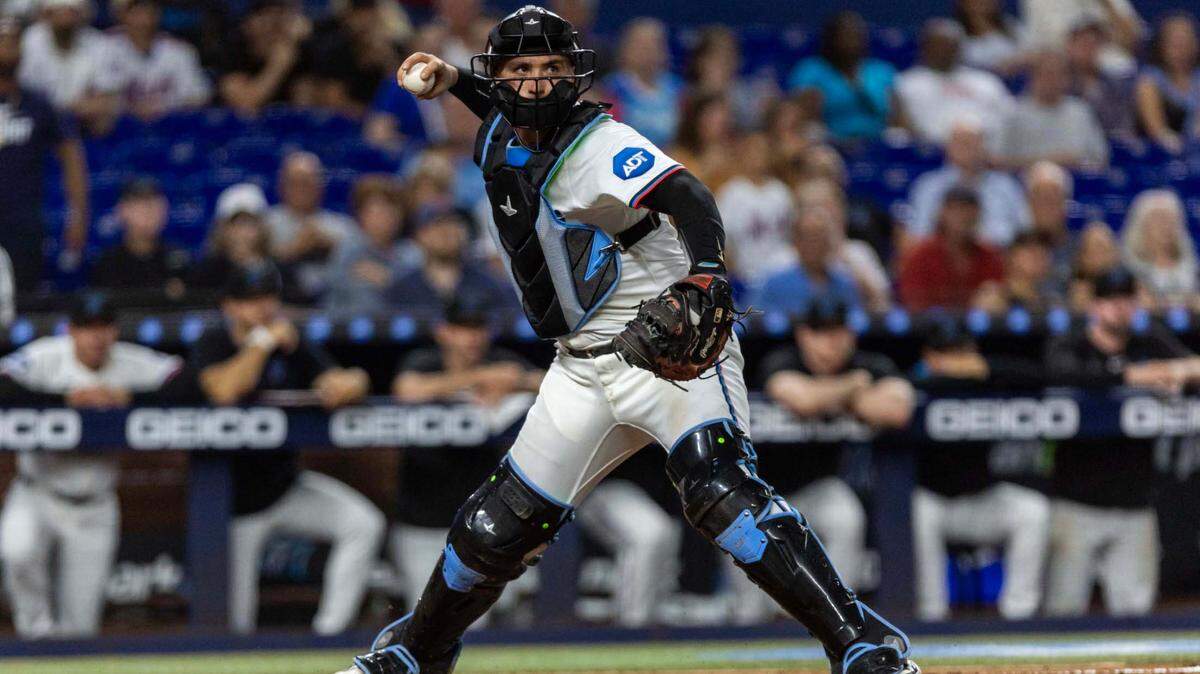 Miami Marlins catcher Nick Fortes (4) throws the ball to first base during the tenth inning of an MLB game against the New York Mets loanDepot park on Wednesday, April 2, 2025, in Miami, Fla.