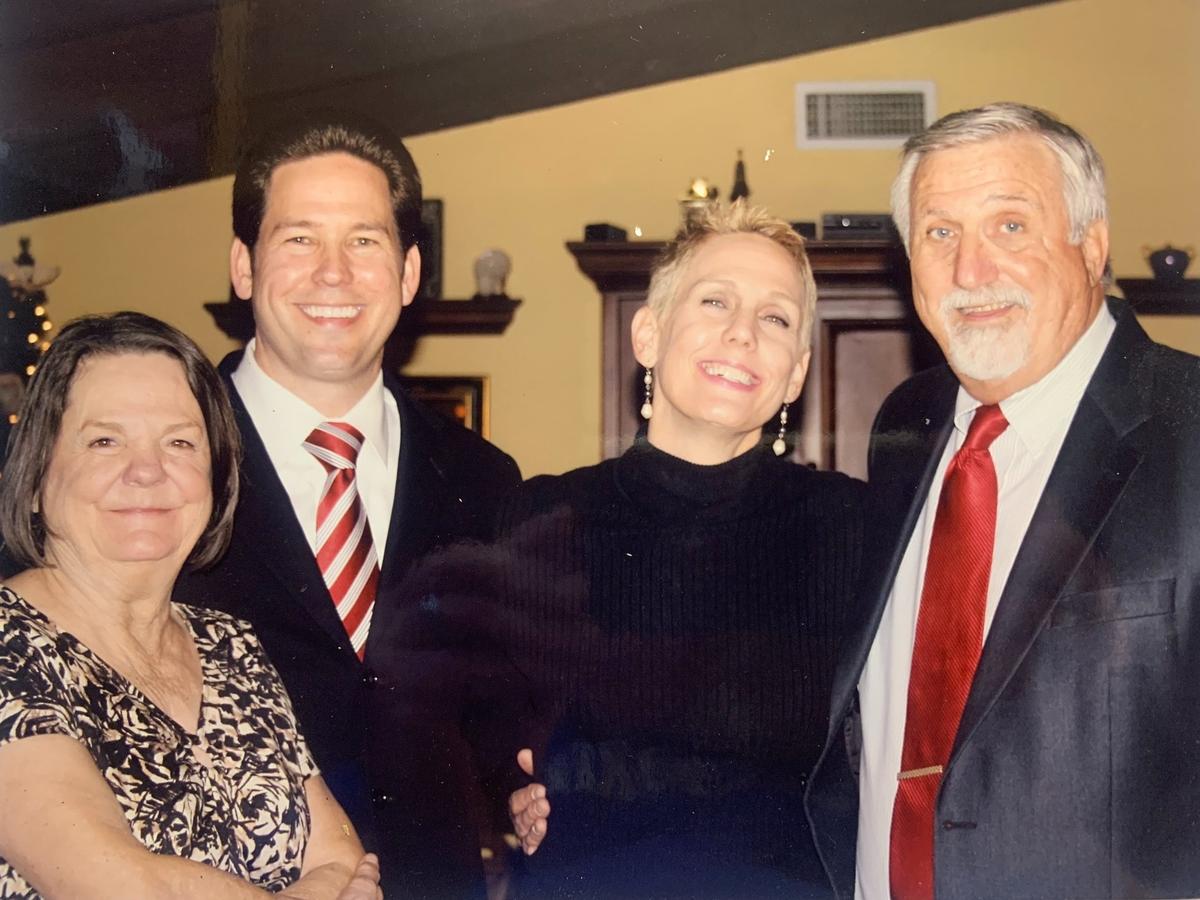 Former longtime Miami-Dade County high school football coach Jim Kroll (right) with his late wife, Suzanne (left), son Jeremy (second from left) and daughter, Melissa Anderton (second from right).