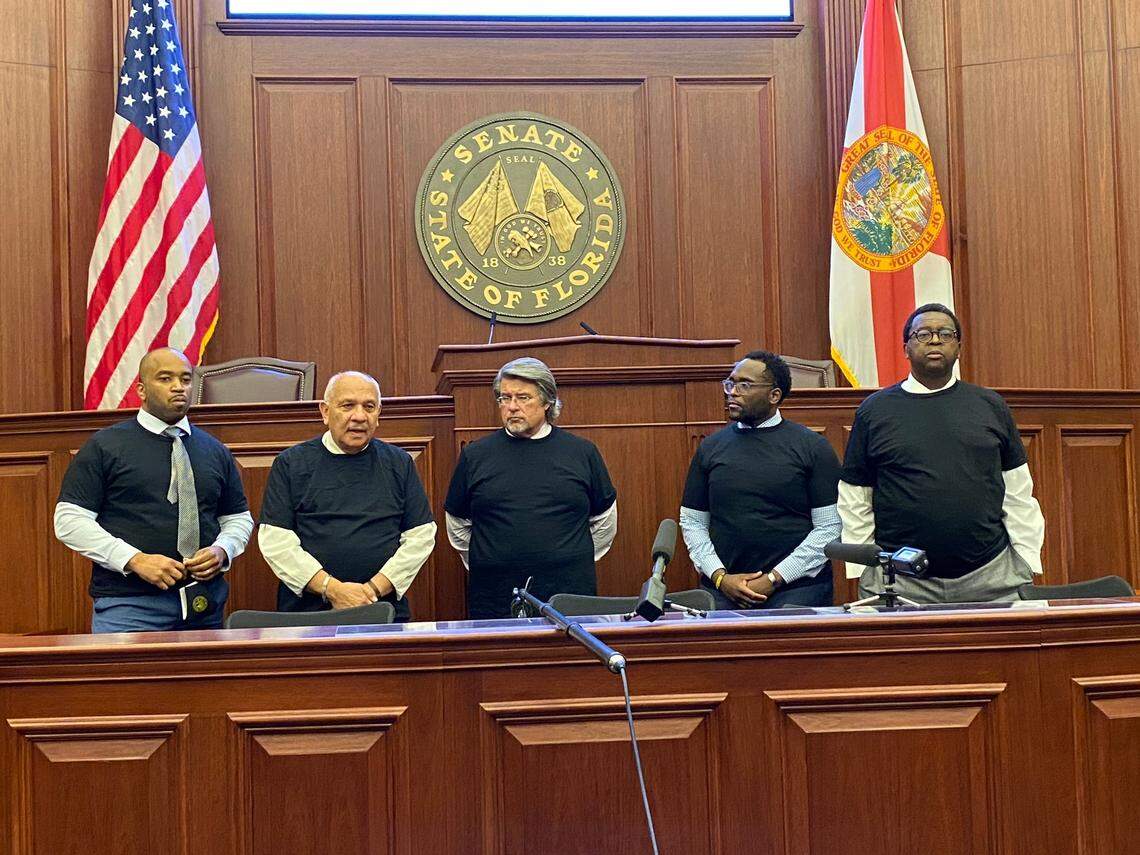 Members of Florida’s Democratic Caucus said they were told by Senate Republican leaders that they were not allowed to wear black T-shirts as a sign of protest during debate on the “anti-riot” bill on Thursday, April 15, 2021, so they put them on for reporters after the vote. From left, Senators Bobby Powell of West Palm Beach, Victor Torres of Orlando, Gary Farmer of Lighthouse Point, Shevrin Jones of Miami Gardens and Perry Thurston of Fort Lauderdale. Jones said they were “mourning the death of our First Amendment rights but also mourning the death of democracy as it slowly slips away.”