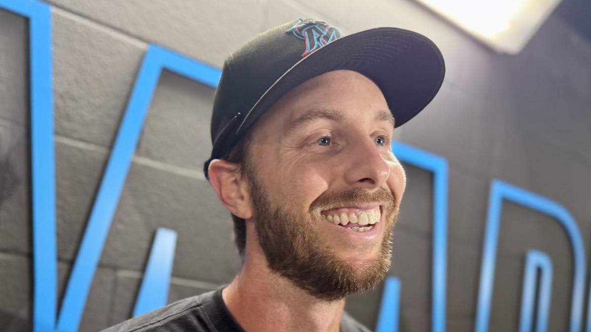 Miami Marlins outfielder Austin Slater speaks to reporters after officially signing with the club on Wednesday, March 25, 2026, at loanDepot park.