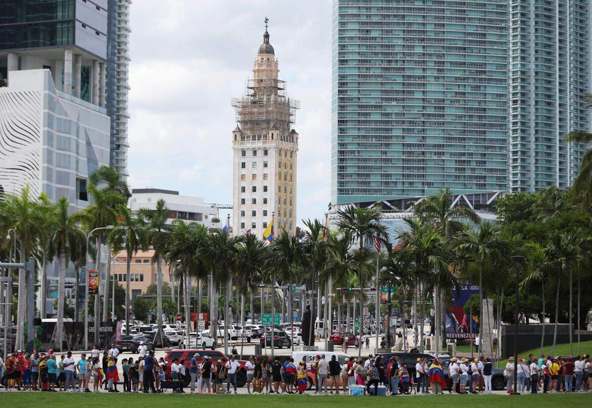 People arrive at a rally at Bayfront Park on in downtown Miami, Fla. The rally was held in opposition of Venezuelan strongman Nicolás Maduro and what many in the international community believe was a rigged election.