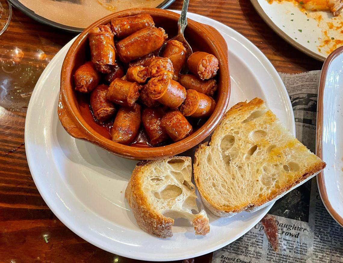Chistorras, sausages cooked in red wine, at Happy Wine Calle Ocho