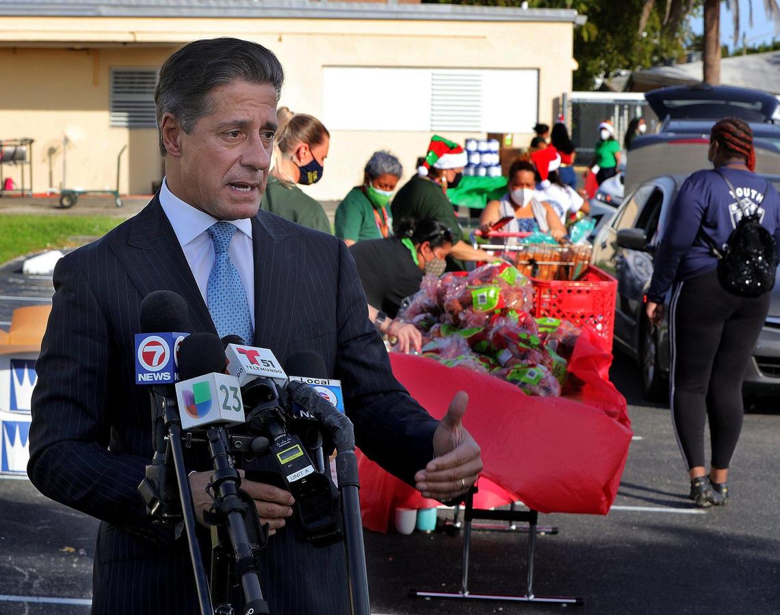 Alberto Carvalho, Miami-Dade Schools superintendent, talks during a food drive at Citrus Grove Elementary on Wednesday.