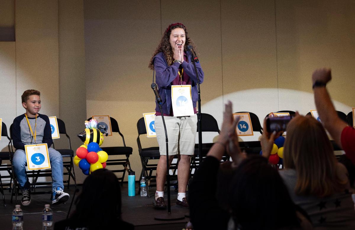 Camila Sanchez-Izquierdo, from Highpoint Academy, wins the Miami Herald Miami-Dade/Monroe County Spelling Bee. Orlando Bodes from Archimedean Academy, left, gets runner up.