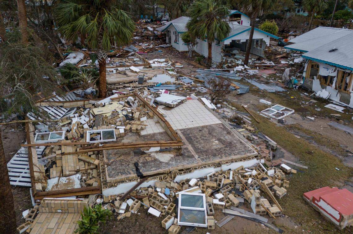 Debris is scattered and some homes ruined by Hurricane Helene on Sept. 28, 2024 in Cedar Key, Florida.