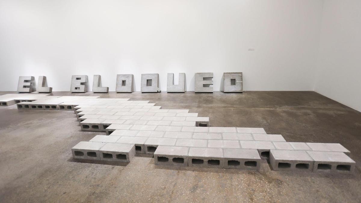 ‘El Bloqueo’ by Antonio Eligio Fernández, who goes by Tonel, is displayed for the Espacio 23 Cuban art show called “You Know Who You Are” on Tuesday, Nov. 1, 2022, in Miami. A version of the piece is also at a museum in Havana. One of the curators noted that the artists have to navigate censorship so many works can have different meanings.
