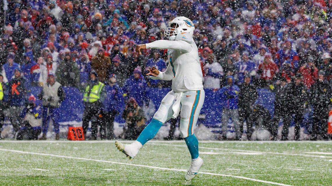 Miami Dolphins quarterback Tua Tagovailoa (1) throws a pass during fourth quarter of an NFL football game against the Buffalo Bills at Highmark Stadium on Saturday, December 17, 2022 in Orchard Park, New York.