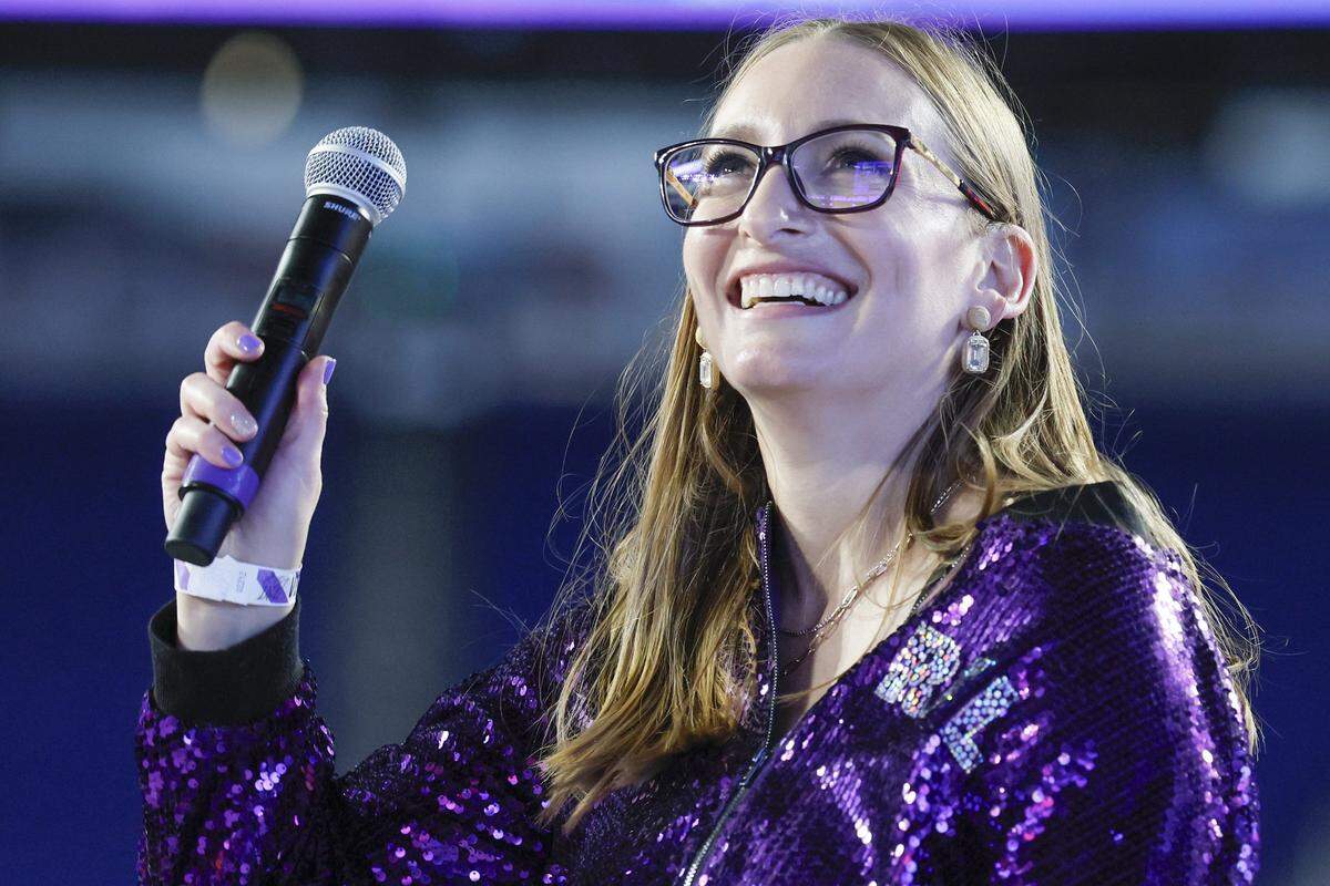 Rebecca Fishman Lipsey, President and CEO of The Miami Foundation, reacts as she views the updated fundraising totals displayed during Give Miami Day at loanDepot Park in Miami, Florida, on Thursday, November 20, 2025.