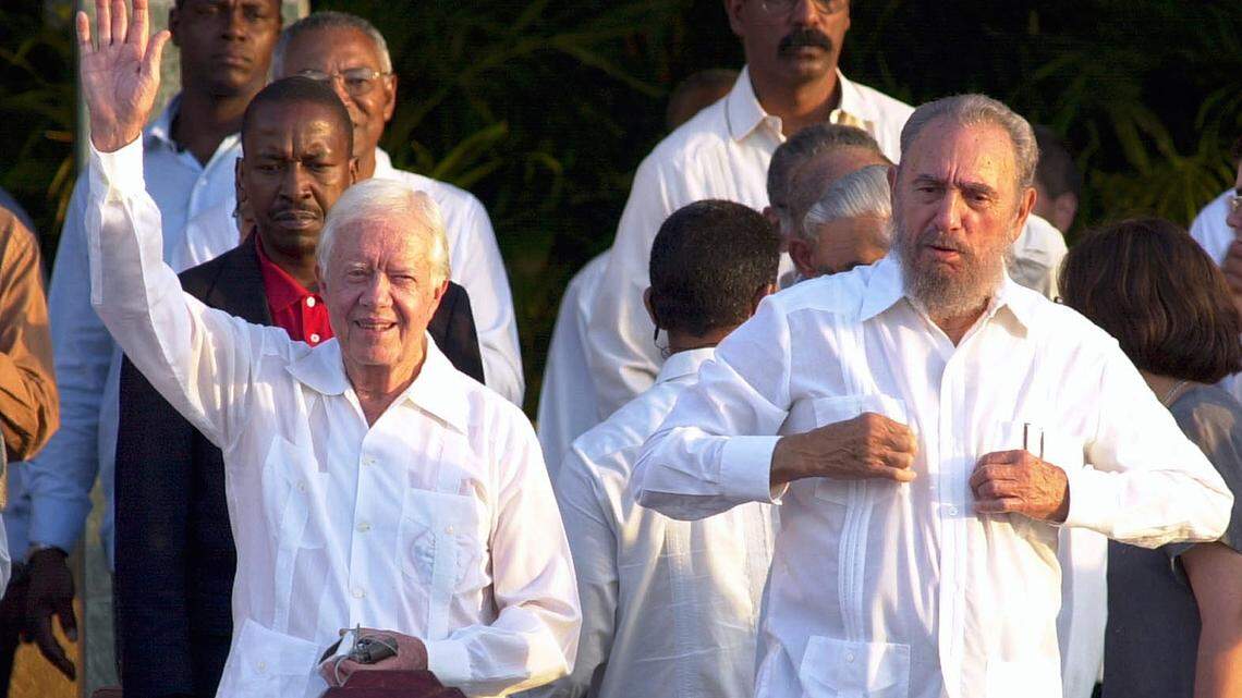 Former U.S. President Jimmy Carter, left, and Cuban leader Fidel Castro are seen in this May 13, 2002 photo. Carter gave a historic speech in Havana calling for democratization on the island.