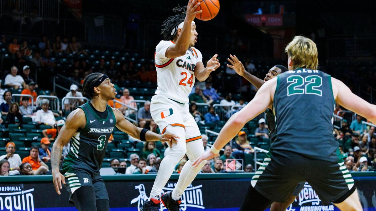 Miami Hurricanes guard Nijel Pack (24) passes the ball to a teammate during the second half of a game on Sunday, Nov. 10, 2024, at Watsco Center in Coral Gables, Fla. The Hurricanes won.