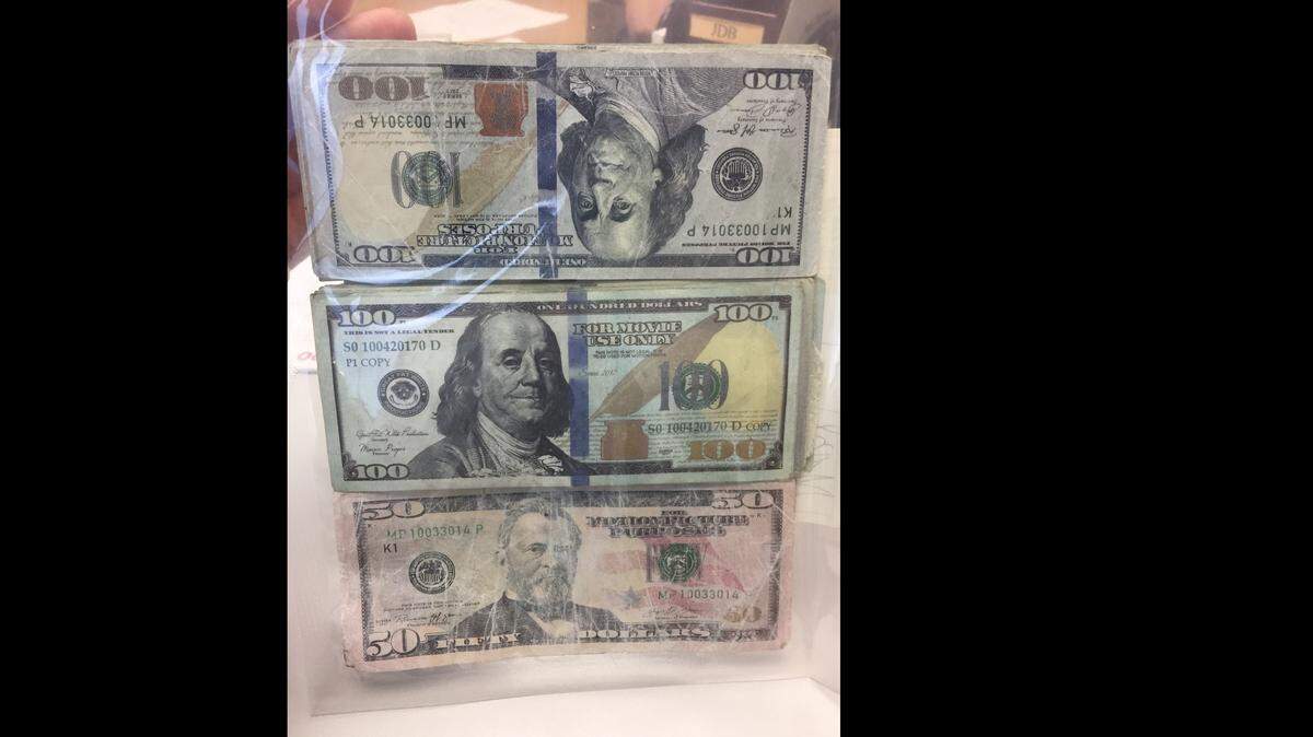 Prop money found in the wallet of a Miami man named Alexander Binker.