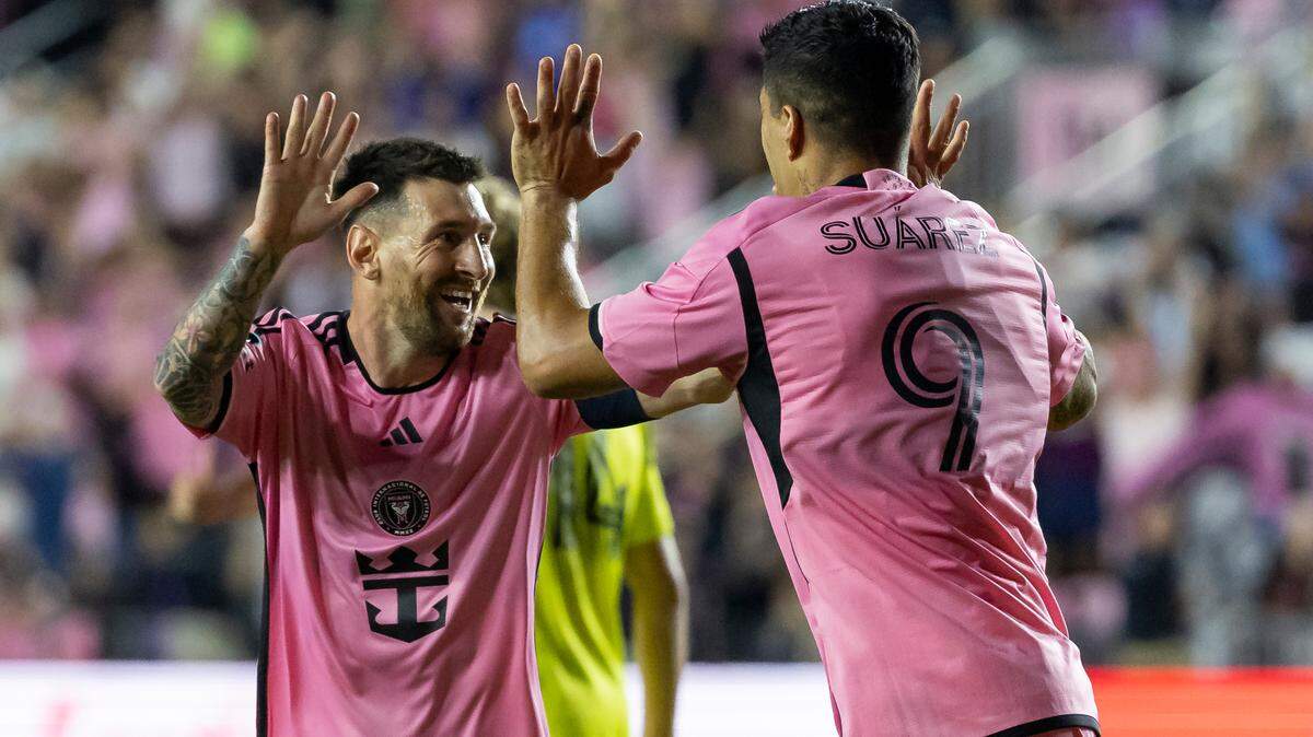 Inter Miami forward Lionel Messi (10) celebrates with Luis Suárez (9) after scoring a goal against Nashville SC in the first half of their CONCACAF Champions Cup tournament soccer match at Chase Stadium on Wednesday, March 13, 2024. Messi has not played since that game, missing four games in a row with a hamstring strain.