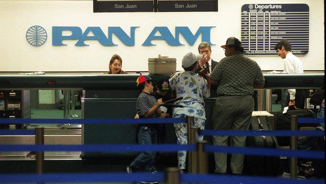 Pan Am ticket counter at Miami international airport ,with a flightheaded to San Juan.