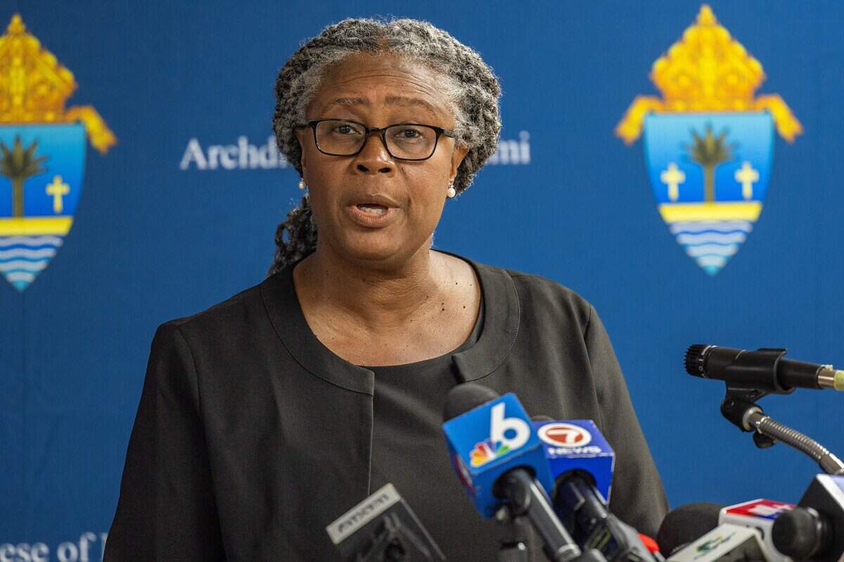 Myriam Mezadieu, chief coordinating officer of Catholic Legal Services speaks during a press conference to address the recent U.S. Supreme Court decision regarding Temporary Protected Status at the Archdiocese of Miami Pastoral Center, Miami Shores, Fla., on Thursday, June 25, 2026.
