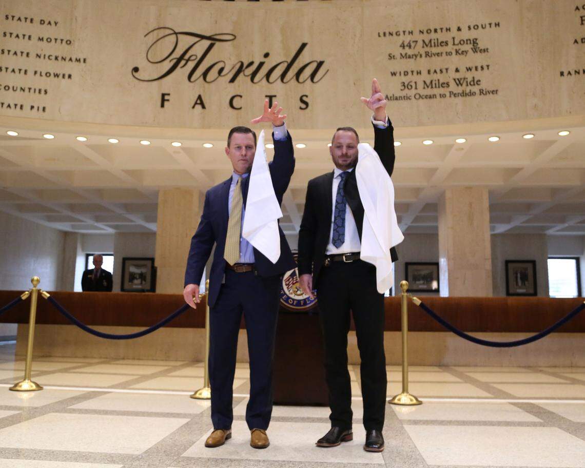 Sergeant at Arms for the House, Russell Hosford, and Tim Hay for the Senate, drop handkerchiefs during the “sine die” ceremony, Saturday, May 4, 2019 to end the annual legislative session in Tallahassee. “Sine die” is a Latin term that means a meeting is adjourned indefinitely or without a future date.