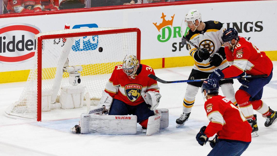 Boston Bruins center Charlie Coyle (13) scores a goal against the defense of Florida Panthers goaltender Alex Lyon (34) and center Aleksander Barkov (16) during the second period of Game 3 of a first round NHL Stanley Cup series at FLA Live Arena on Friday, April 21, 2023 in Sunrise, Fl.