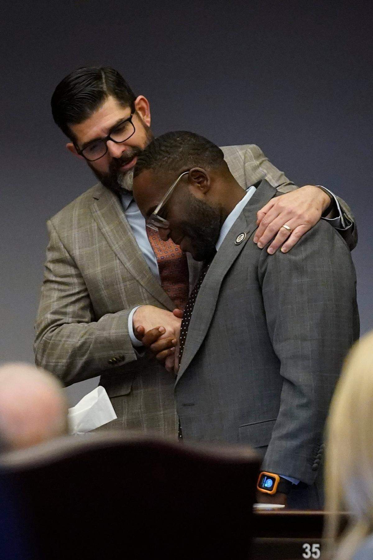 Florida Sen. Manny Diaz Jr., left, embraces Sen. Shevrin Jones after the passage of a bill during a legislative session at the Florida State Capitol, Thursday, March 10, 2022, in Tallahassee, Fla.