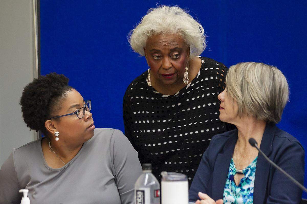 Broward Supervisor of Elections Brenda Snipes, middle, at her offices in Lauderhill as the canvassing board reviews ballots on Nov. 10, 2018.