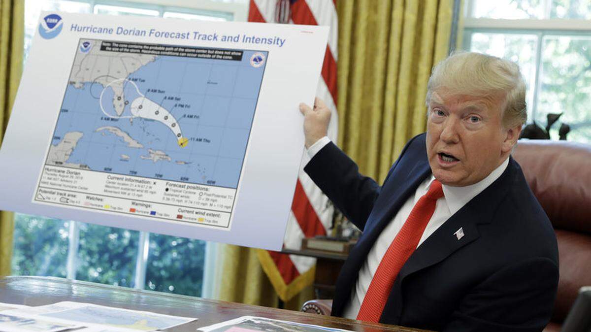 President Trump displays a map of Hurricane Dorian’s projected path clearly altered to include Alabama, which was not in danger from the storm.
