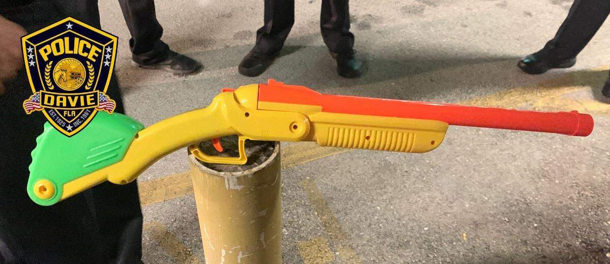 An investigation is underway after a man with a toy gun sent three Davie college campuses into lockdown.
