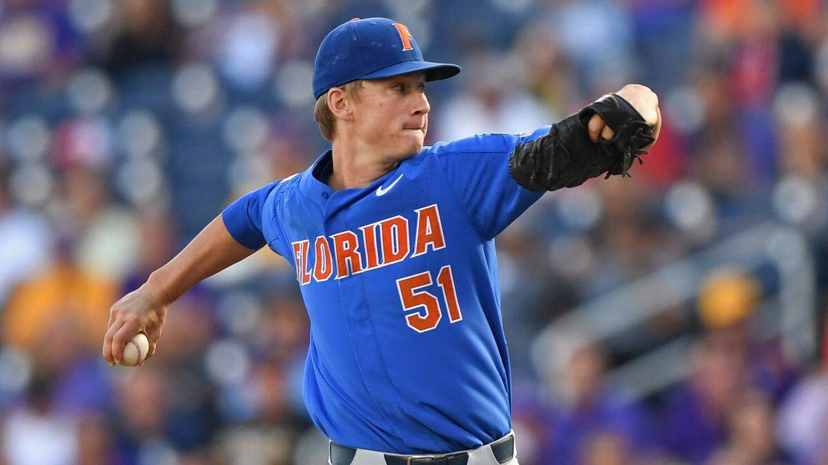 Pitcher Brady Singer of the Florida Gators delivers a pitch against the LSU Tigers in the first inning during game one of the College World Series Championship Series on June 26, 2017, at TD Ameritrade Park in Omaha, Nebraska.