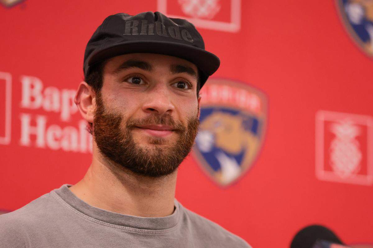Sep 19, 2025; Fort Lauderdale, FL, USA; Florida Panthers center Luke Kunin (71) speaks to reporters before practice at Baptist Health IcePlex.