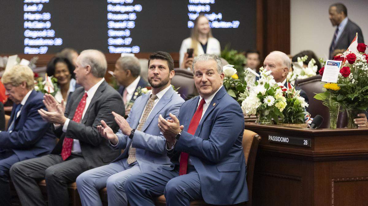 Florida Attorney General James Uthmeier (center in light blue) attends the first day of the legislative session at the Florida State Capitol on Tuesday, March 4, 2025, in Tallahassee, Fla.