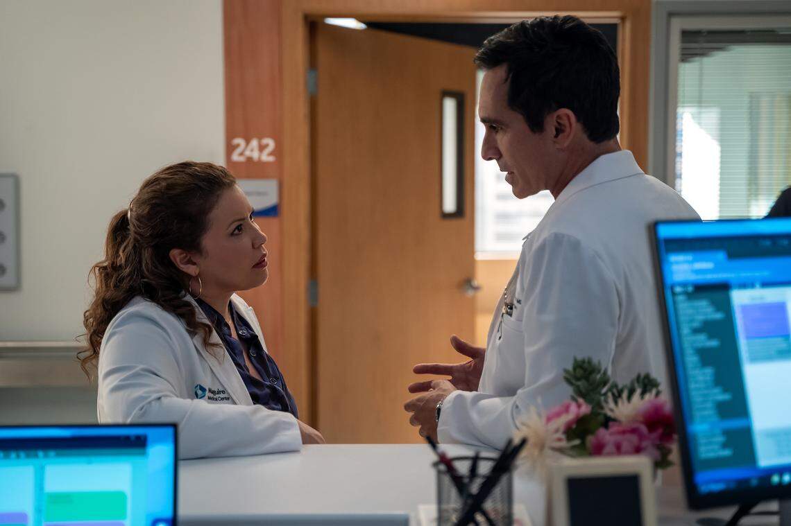 PULSE. (L-R) Justina Machado as Dr. Natalie Cruz and Néstor Carbonell as Dr. Ruben Soriano in Episode 109 of Pulse. Cr. Jeff Neumann/Netflix © 2024